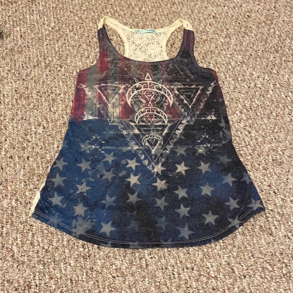 American flag tank top, with a lace back. Worn once a from Maurice’s. Size XS